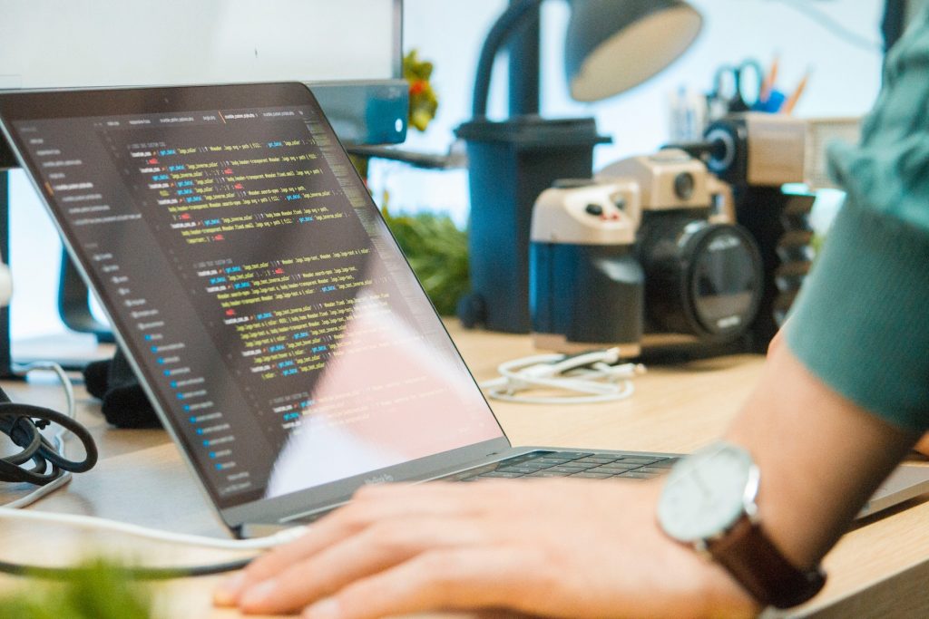 Image of man looking at computer