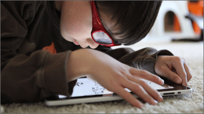 Child looking at screen to symbolize COPPA rules for online advertising