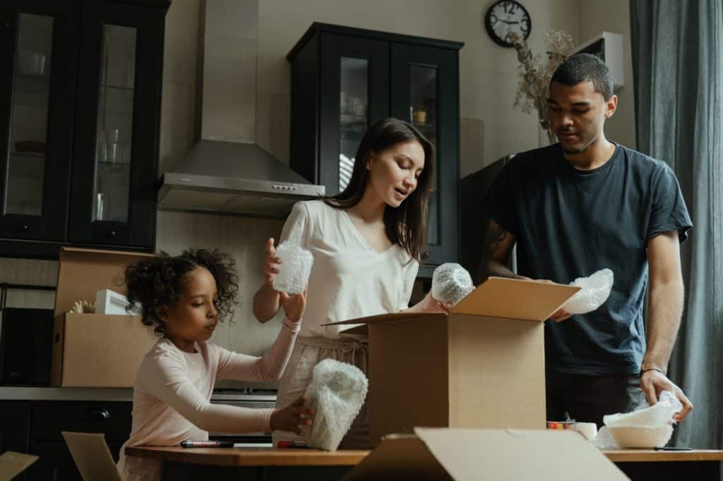 Family opening a delivery from a subscription-based service.