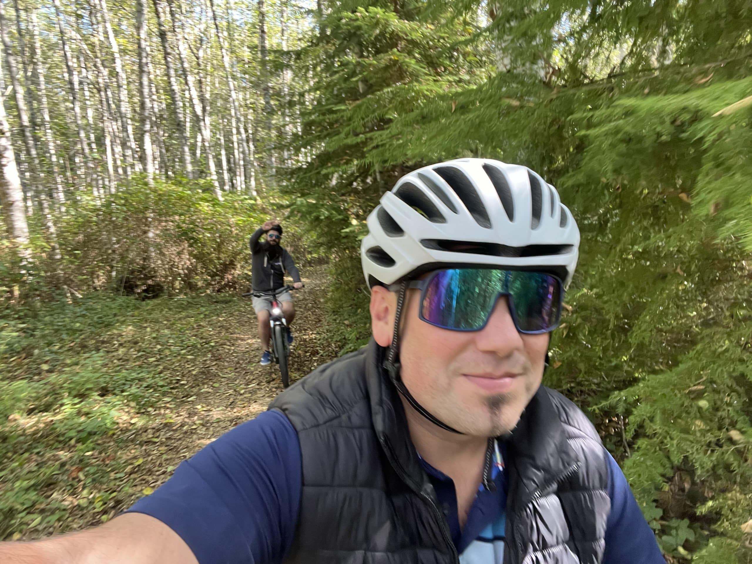 E-biking through the woods in Port Ludlow at the TUNE retreat