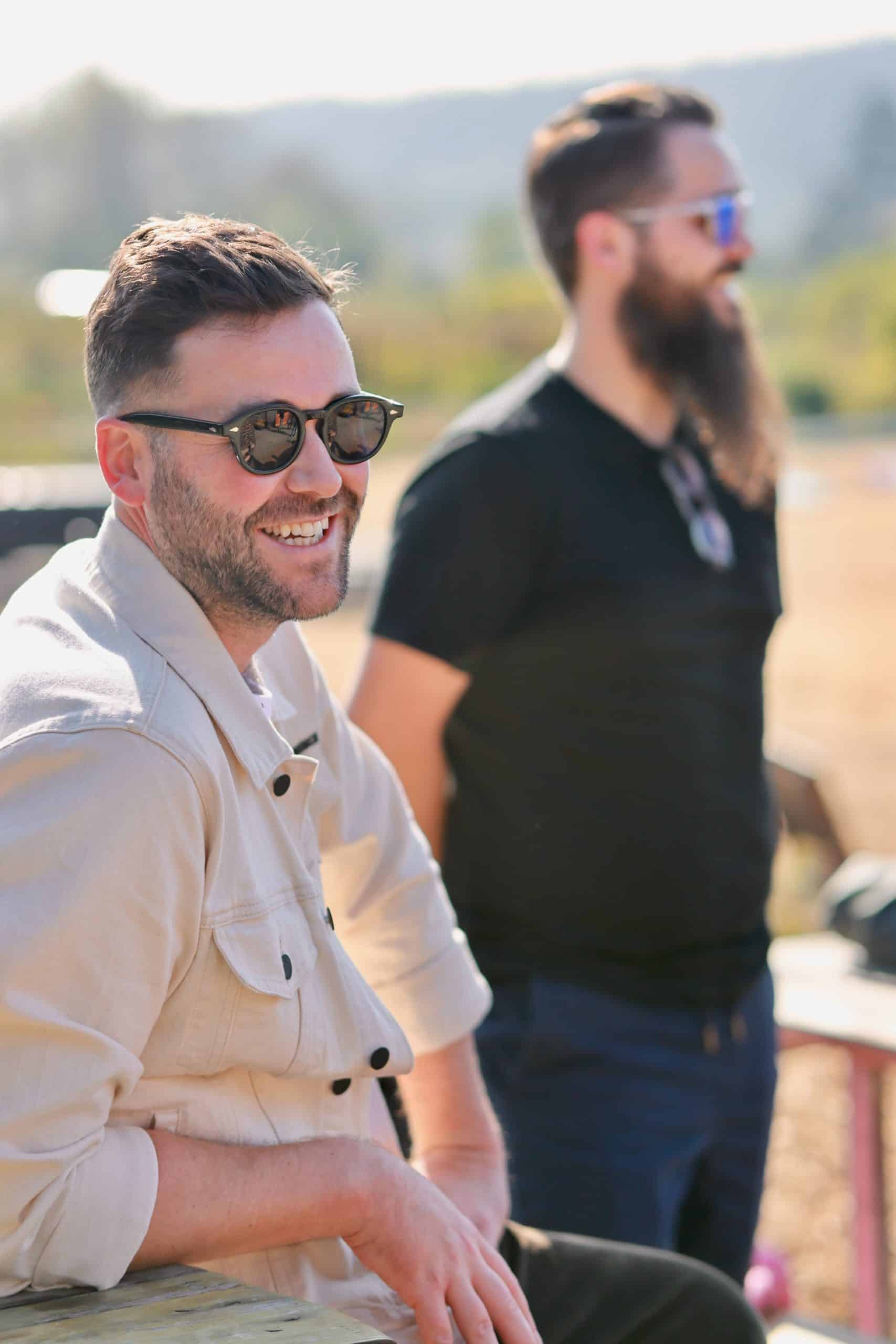 Connor and Matt of TUNE enjoy some time in the sun at Finnriver Cidery