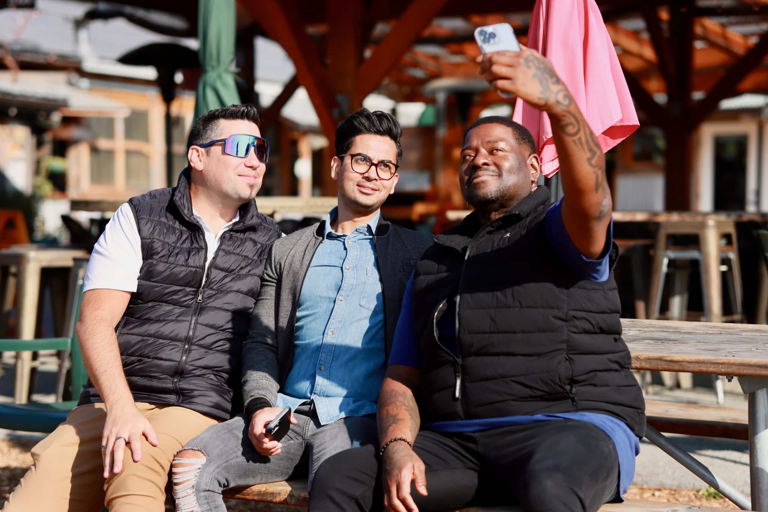 Dan, Daniel, and Tie take a selfie during TUNE's tour of Finnriver Cidery