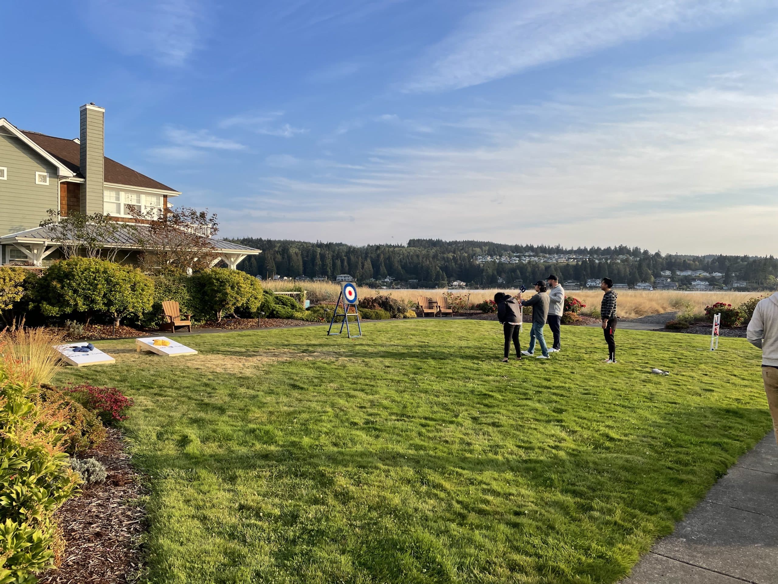 The final rays of the sun shining down on the lawn at the Inn in Port Ludlow, where TUNE's 2022 retreat was held