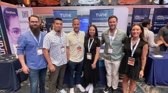 TUNE booth team at Affiliate Summit East 2023