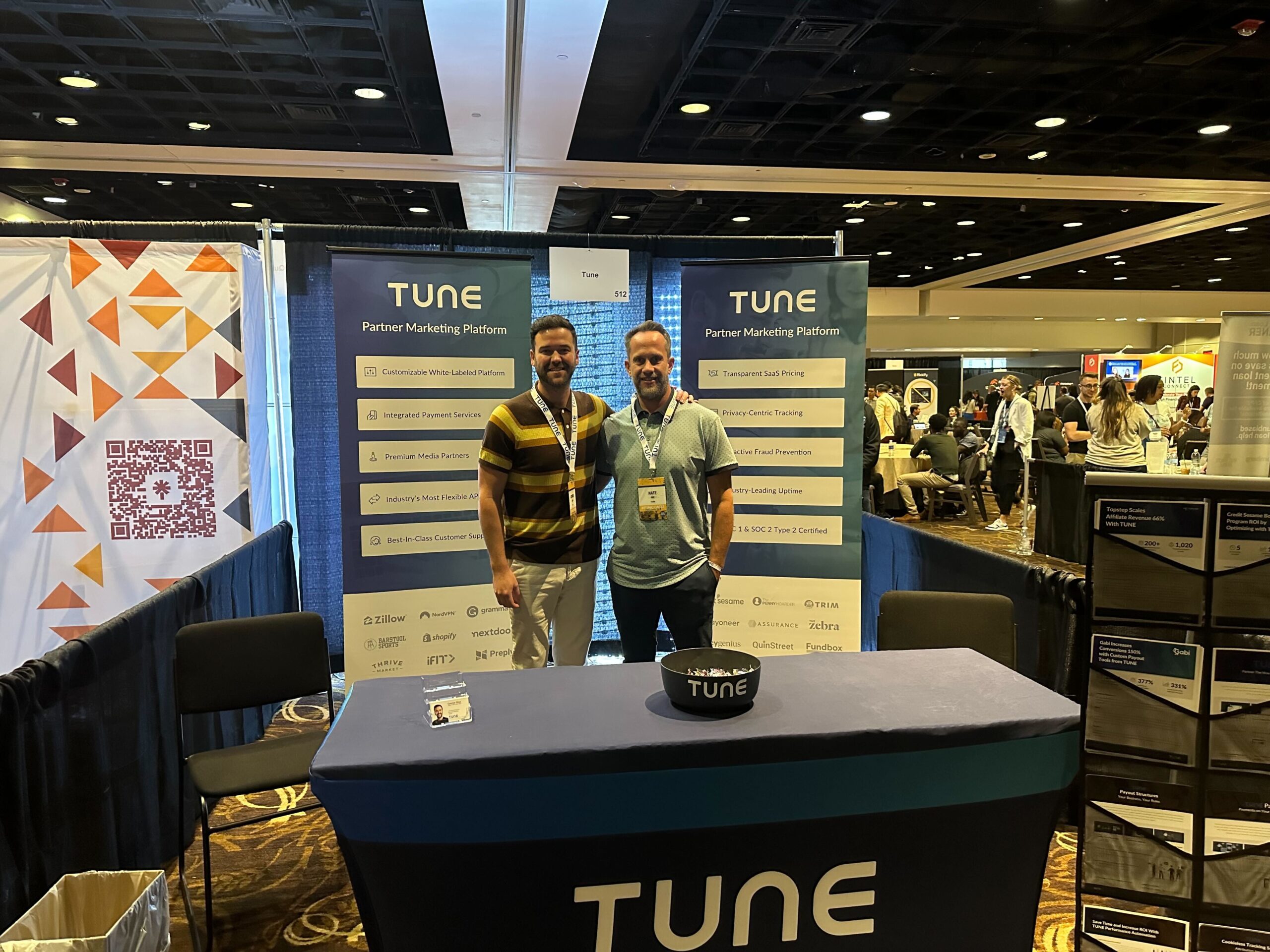 Nate Ivie and the author at the TUNE booth during FinCon 2023.